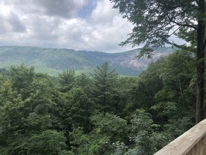 A forested mountain landscape with a wooden railing. - Four Seasons Private Suite on Chestnut Ridge in Highlands - Private Club Access (Highlands)