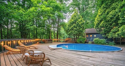 Pool, sauna, large 2000sf deck, tennis court, a private trail, 15.5 acres