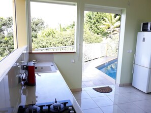 Microwave, coffee/tea maker, cookware/dishes/utensils - Quiet and warm apartment with private pool. (RIVIERE-SALEE)