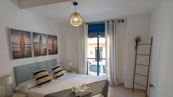 2 dormitorios, tabla de planchar con plancha, wifi gratis y ropa de cama