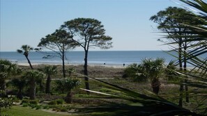 On the beach, sun-loungers