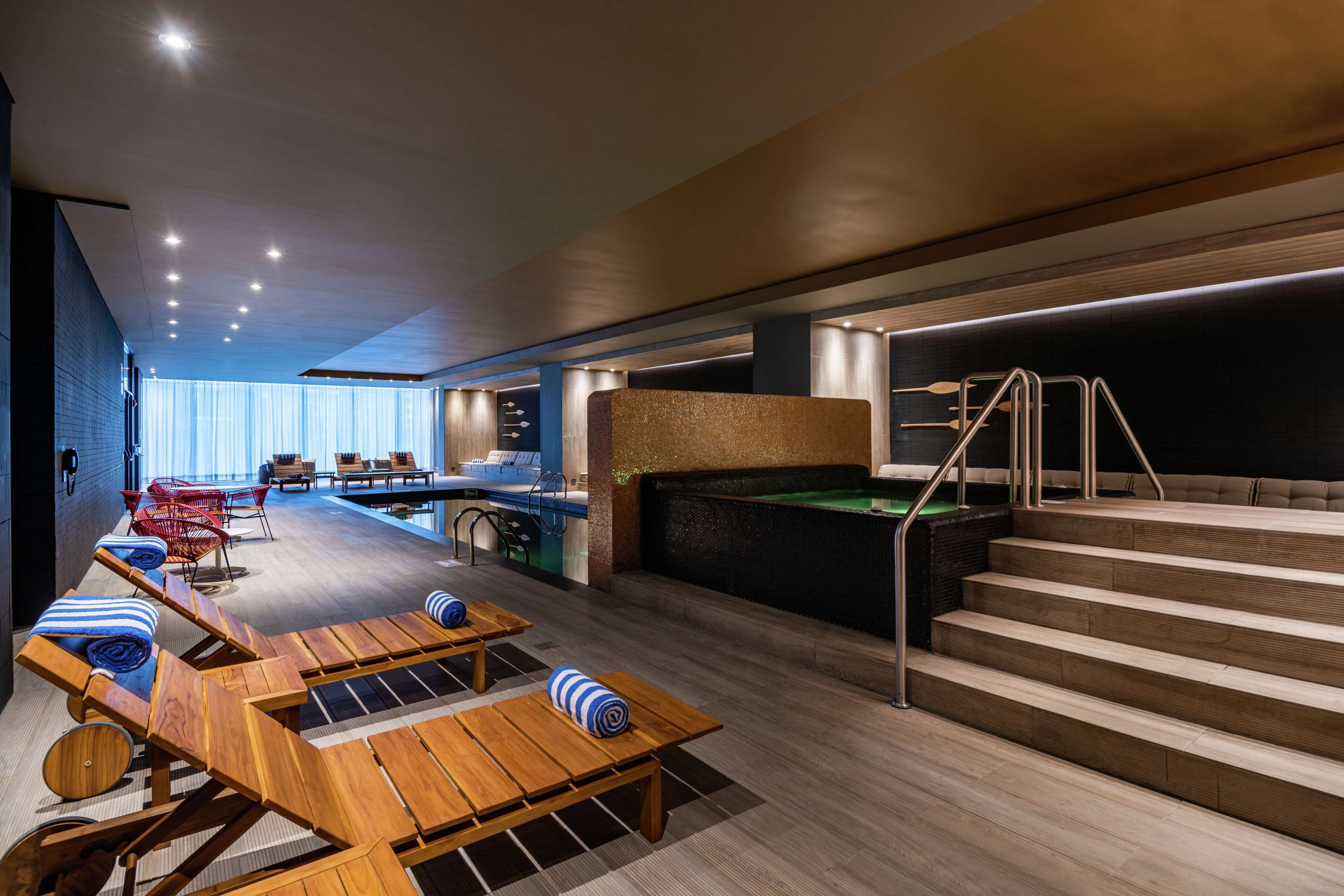 indoor pool, open 11:00 am to 7:00 pm, pool loungers