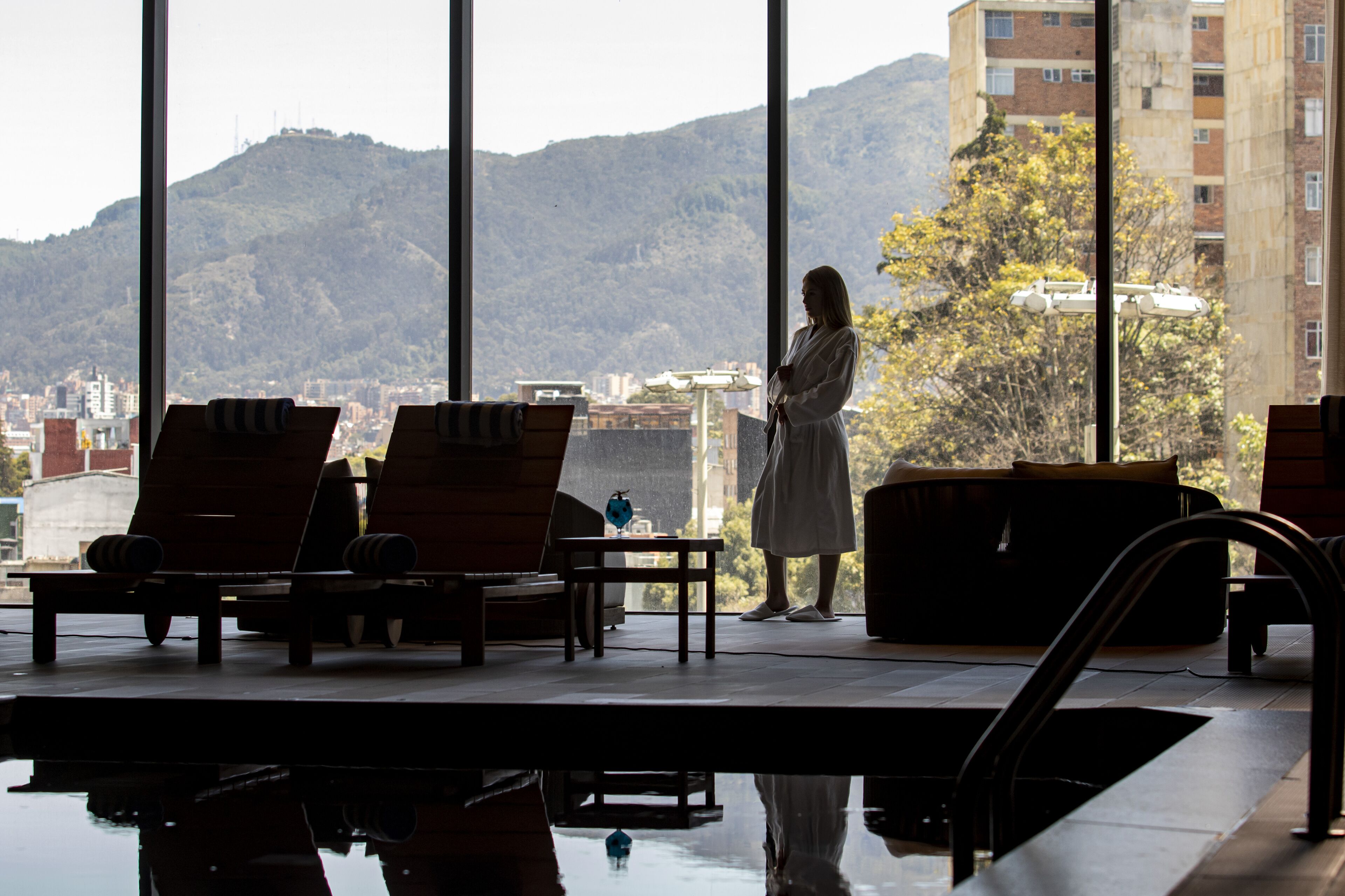 Indoor pool, open 11:00 AM to 7:00 PM, pool loungers