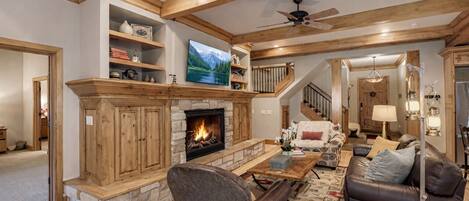 Una Smart TV, una chimenea, una impresora