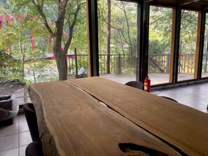 Family House, 4 Bedrooms, Accessible | Living area | Flat-screen TV - Mhuwe hotspring (Ren'ai)