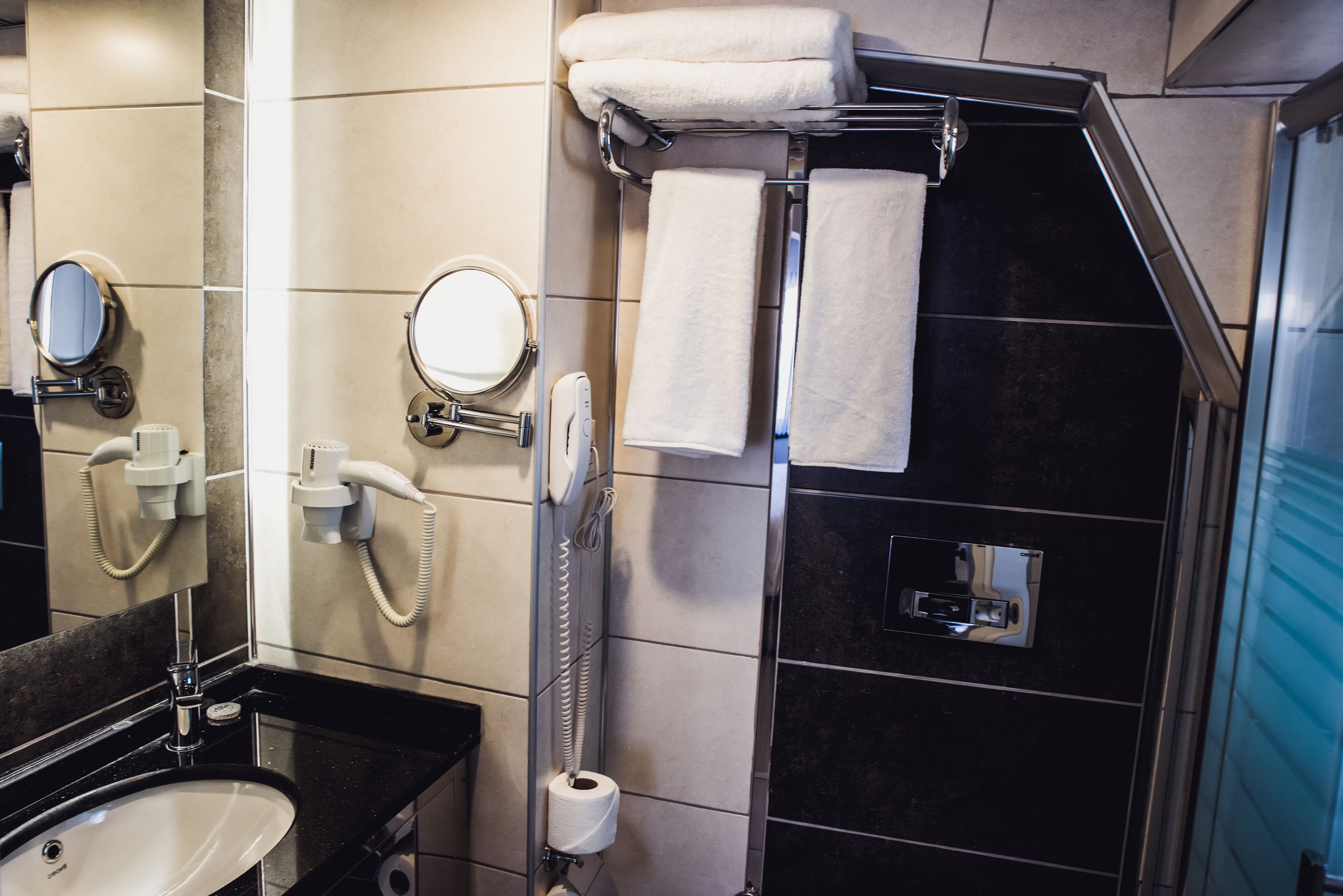 shower, rainfall showerhead, eco-friendly toiletries, hair dryer