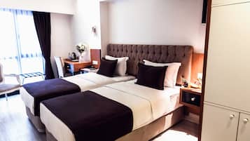 Literie de qualité supérieure, matelas mémoire de forme, minibar