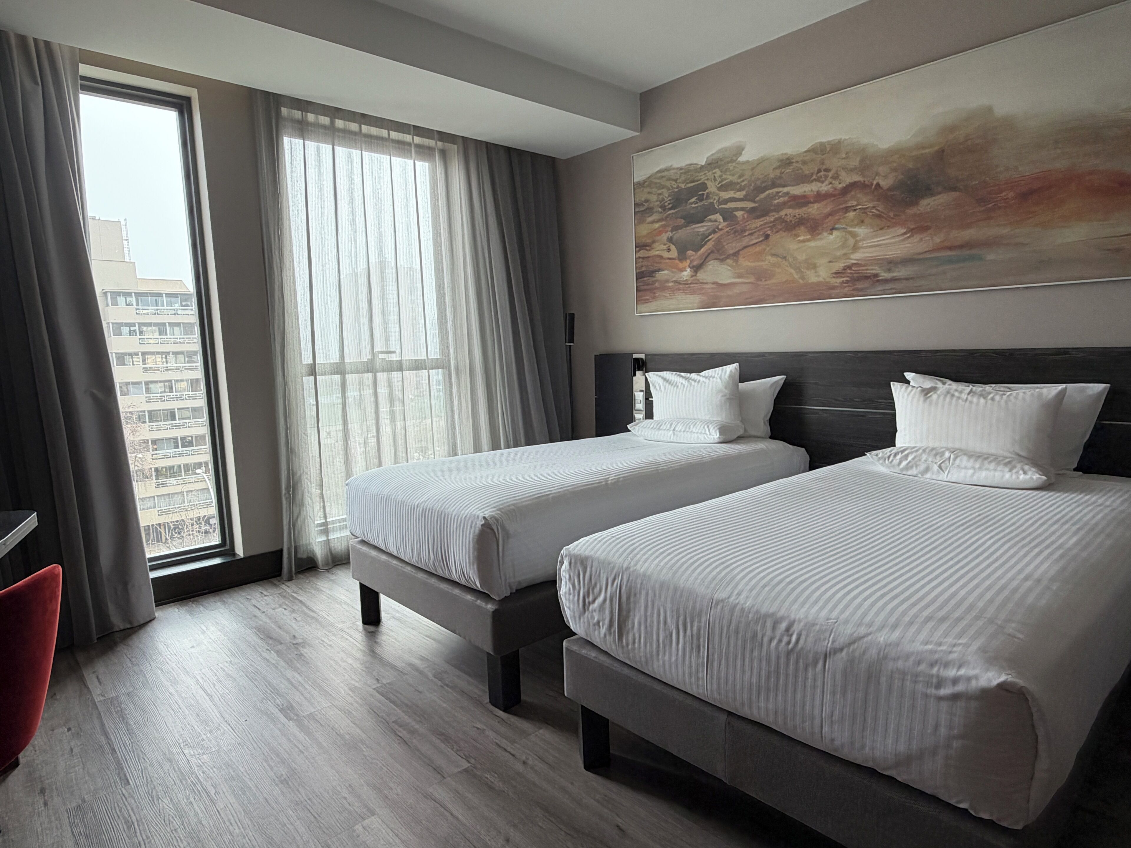Superior Twin Room | Minibar, in-room safe, desk, laptop workspace