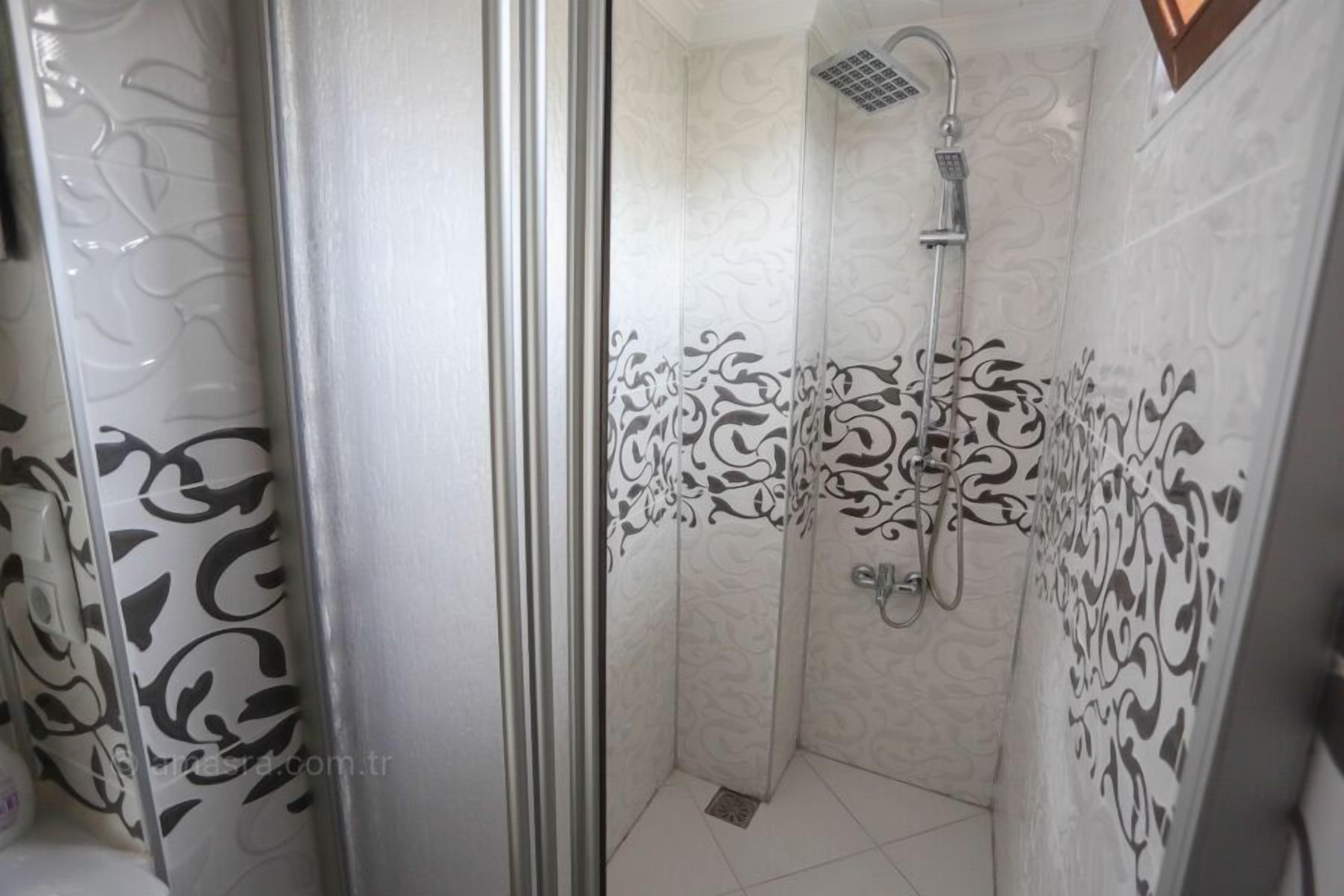 shower, free toiletries, hair dryer, slippers