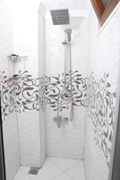 Shower, free toiletries, hair dryer, slippers