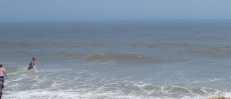On the beach, sun-loungers