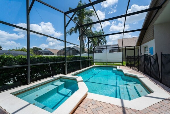 Outdoor pool - Luxurious Oasis: 4BR, 2-Master Bedrooms, Games Room, Playground & Relaxing Spa! (Kissimmee)