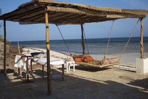On the beach, sun-loungers, beach towels