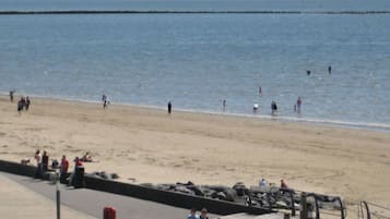 On the beach, sun-loungers, beach towels