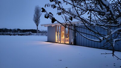 bright Danish timber house with open views to nature, pets welcome