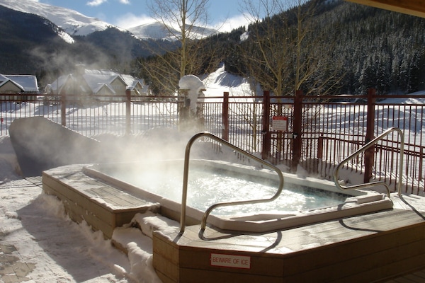 Watch skiers & tubing hill from large hot tub