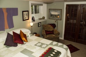 1 bedroom, desk, iron/ironing board, travel crib