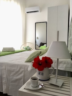 Egyptian cotton sheets, premium bedding, down duvets, memory-foam beds