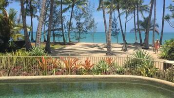 On the beach, sun-loungers, beach towels