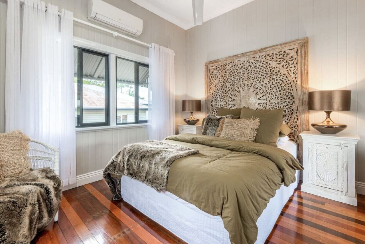 A bright bedroom filled with natural light.