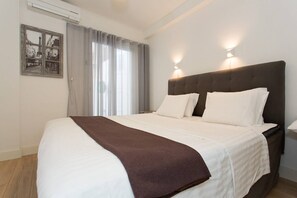 2 عدّة غرف نوم ومكواة/لوح كي وواي فاي وملاءات أسرّة