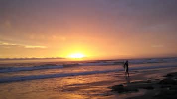 On the beach, sun-loungers, beach towels