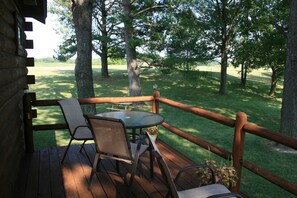Outdoor dining - Rest, Relax and Renew. Our log cabin experience awaits your arrival. (Anna)