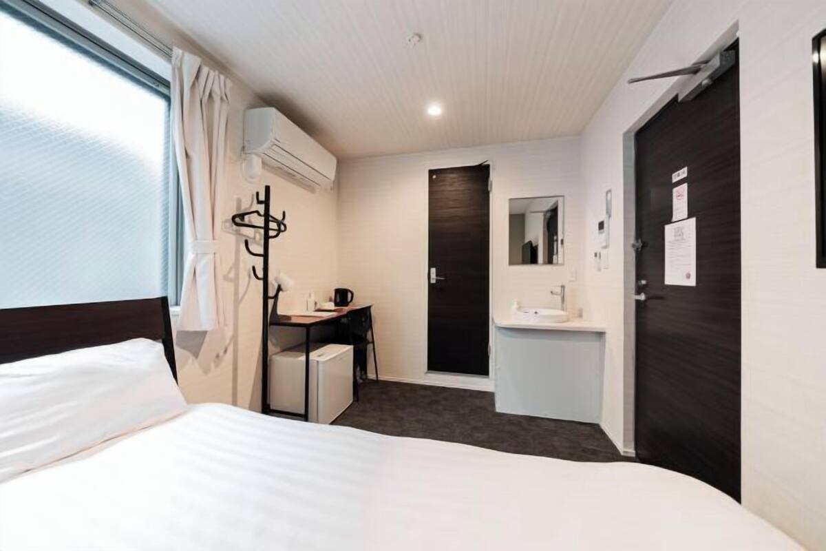 Desk, blackout curtains, iron/ironing board (on request), free WiFi