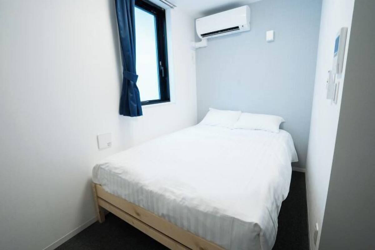 Desk, blackout curtains, iron/ironing board (on request), free WiFi
