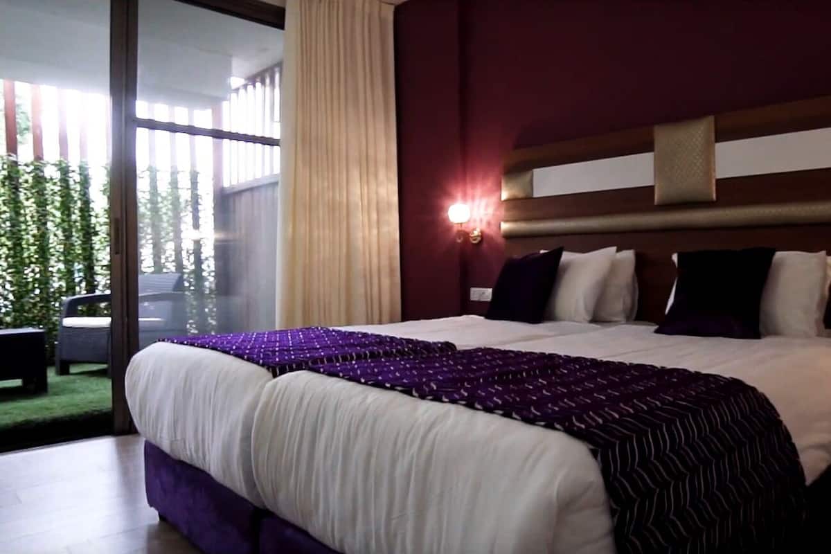 Deluxe Double or Twin Room, Patio | Minibar, in-room safe, desk, laptop workspace