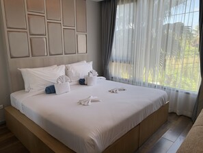 In-room safe, blackout drapes, iron/ironing board, bed sheets