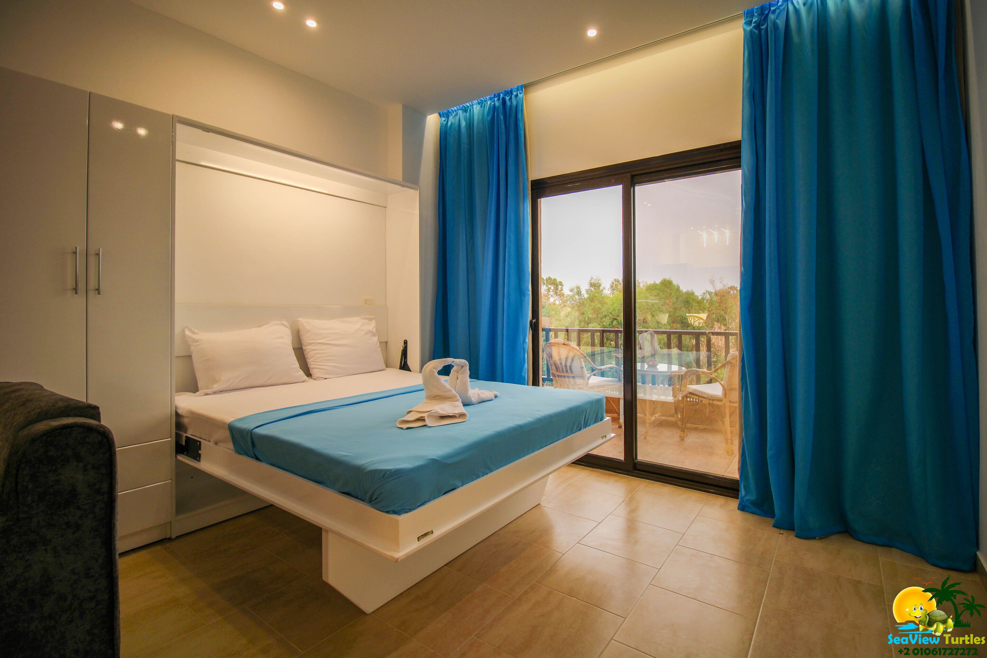 SeaView Turtles F23 trendy | Área de estar | TV LCD