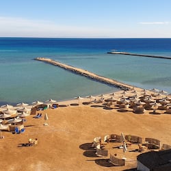 Private beach, beach umbrellas, beach bar