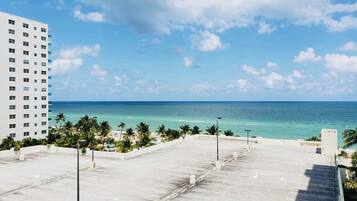 On the beach, sun loungers, beach towels