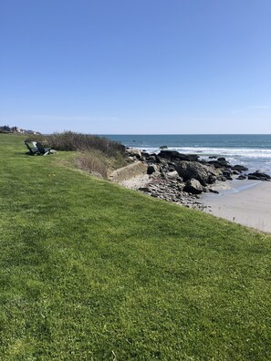 On the beach, sun loungers, beach towels