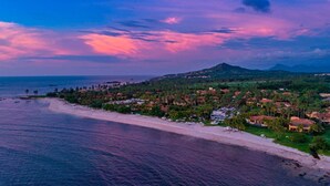 A coastal resort with beachfront villas, a sandy beach, and a mountainous backdrop. - Splendid 5-bedroom ocean-view villa at The Four Seasons Punta Mita (Punta de Mita)