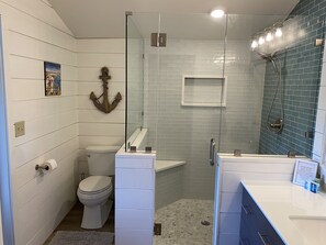 Combined shower/tub, hair dryer, towels, soap