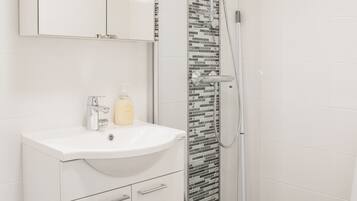 Shower, free toiletries, hair dryer, towels