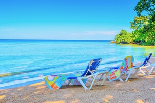 Private beach, white sand, free beach cabanas, sun loungers