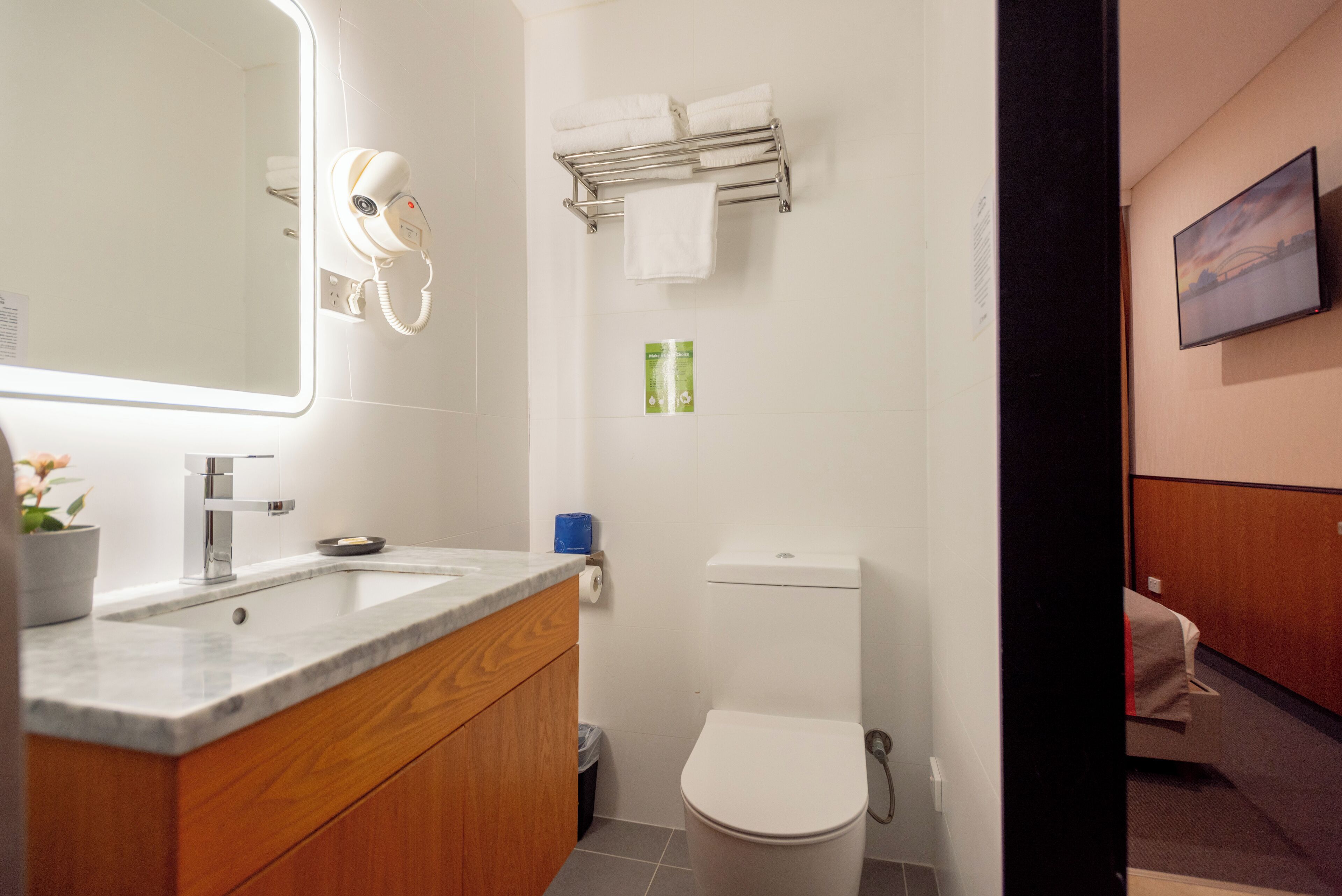 compact queen room | bathroom | shower, rainfall showerhead, free toiletries, hair dryer