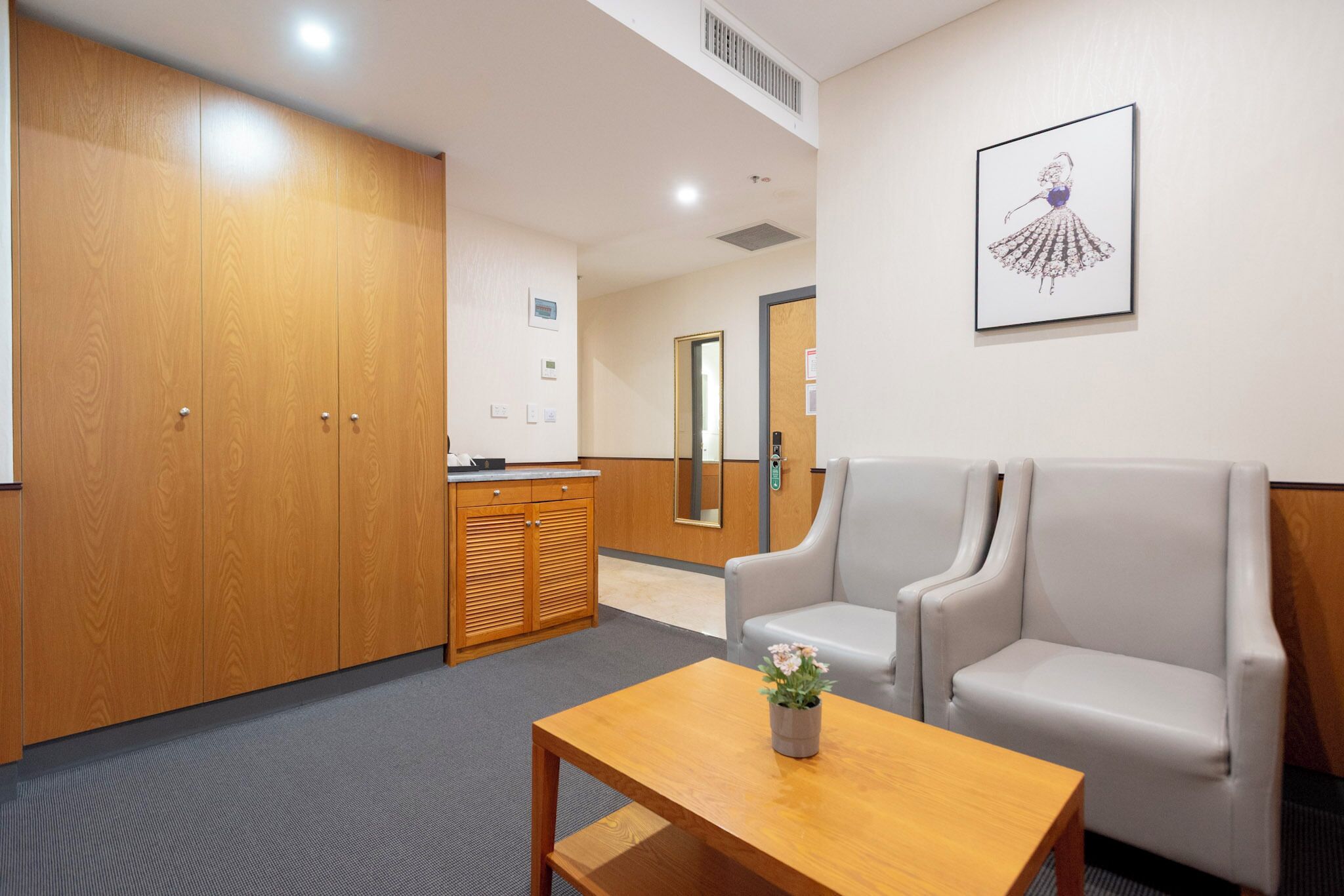 signature suite, multiple beds | living area | lcd tv