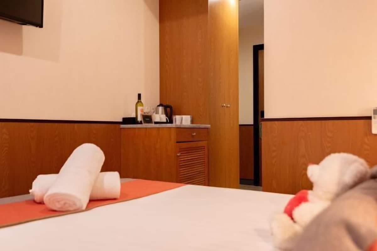 Minibar, in-room safe, blackout curtains, iron/ironing board