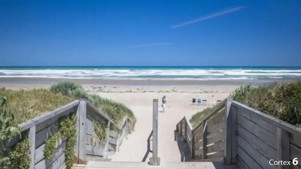 A wooden staircase leading to a beach with a clear sky. - THE SHACK - GOOLWA CENTRAL (Goolwa)