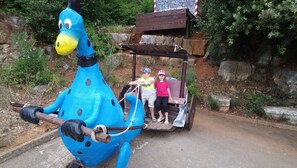 Experience a whimsical ride with a friendly duck character.