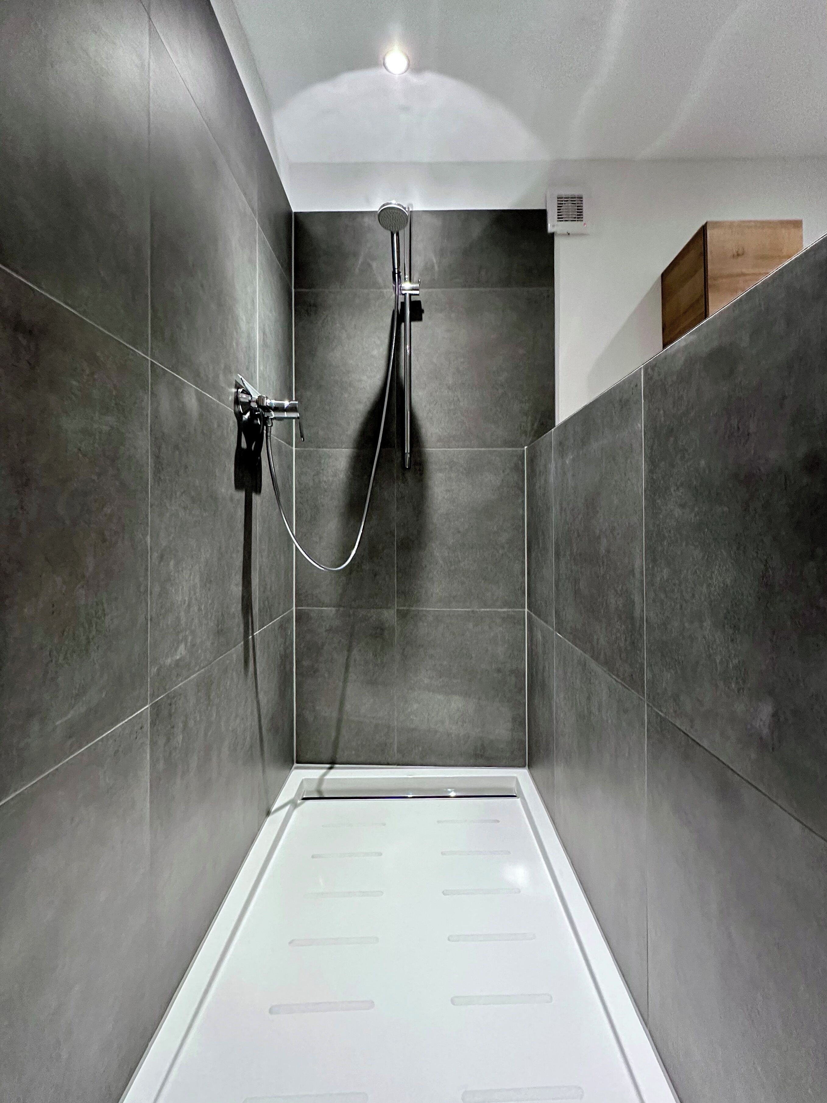 Bathtub, hair dryer, towels