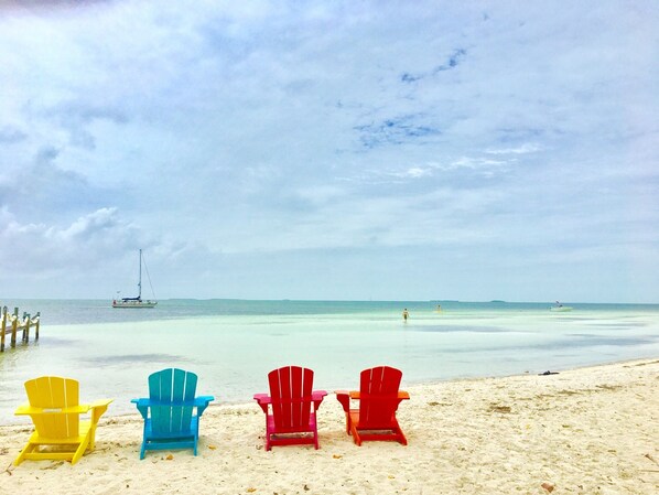 On the beach, sun loungers, beach towels