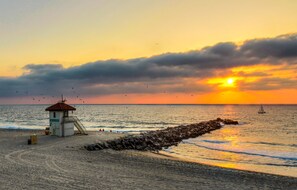 On the beach, sun-loungers, beach towels