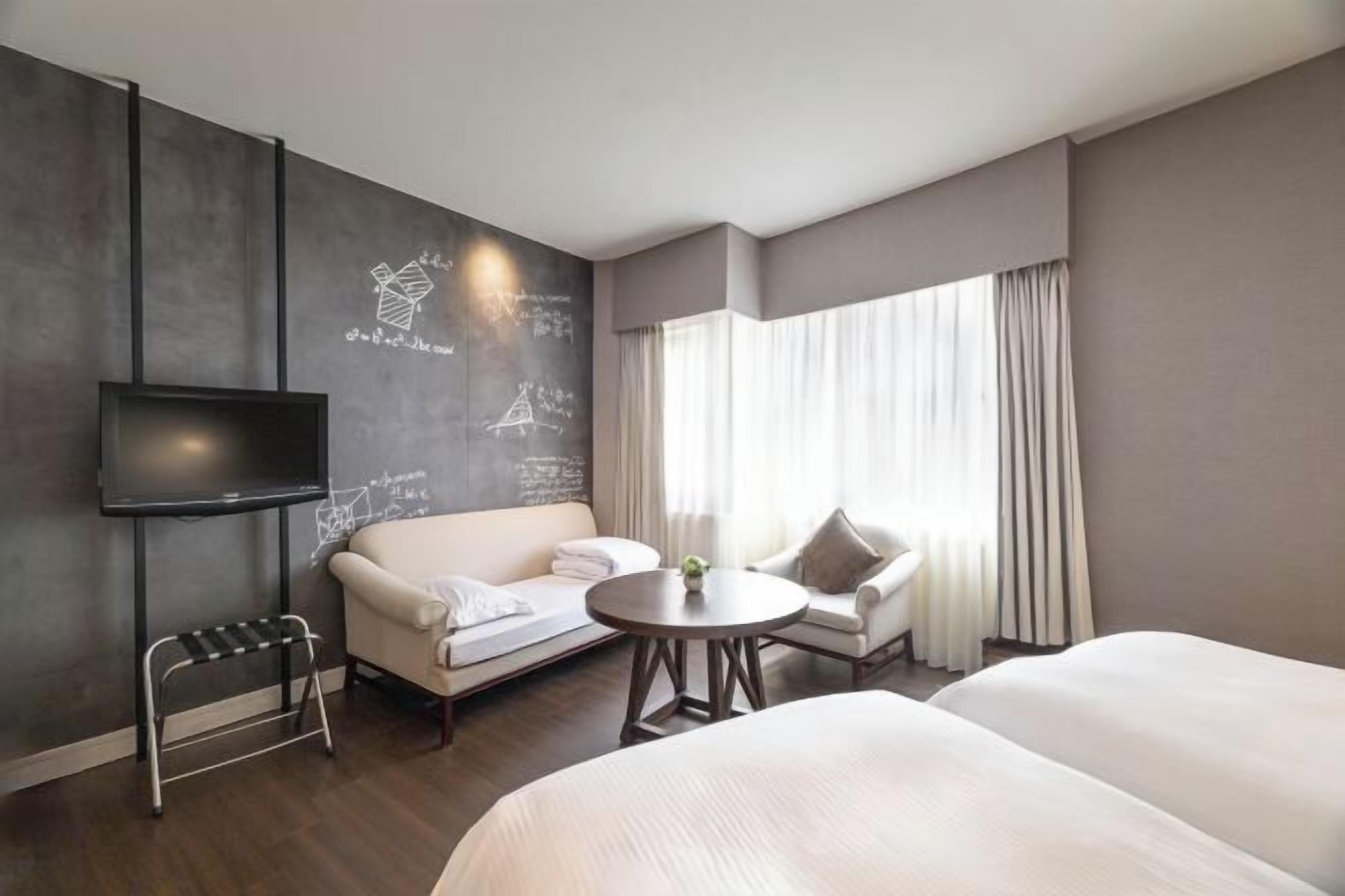 Premium bedding, down comforters, in-room safe, blackout drapes