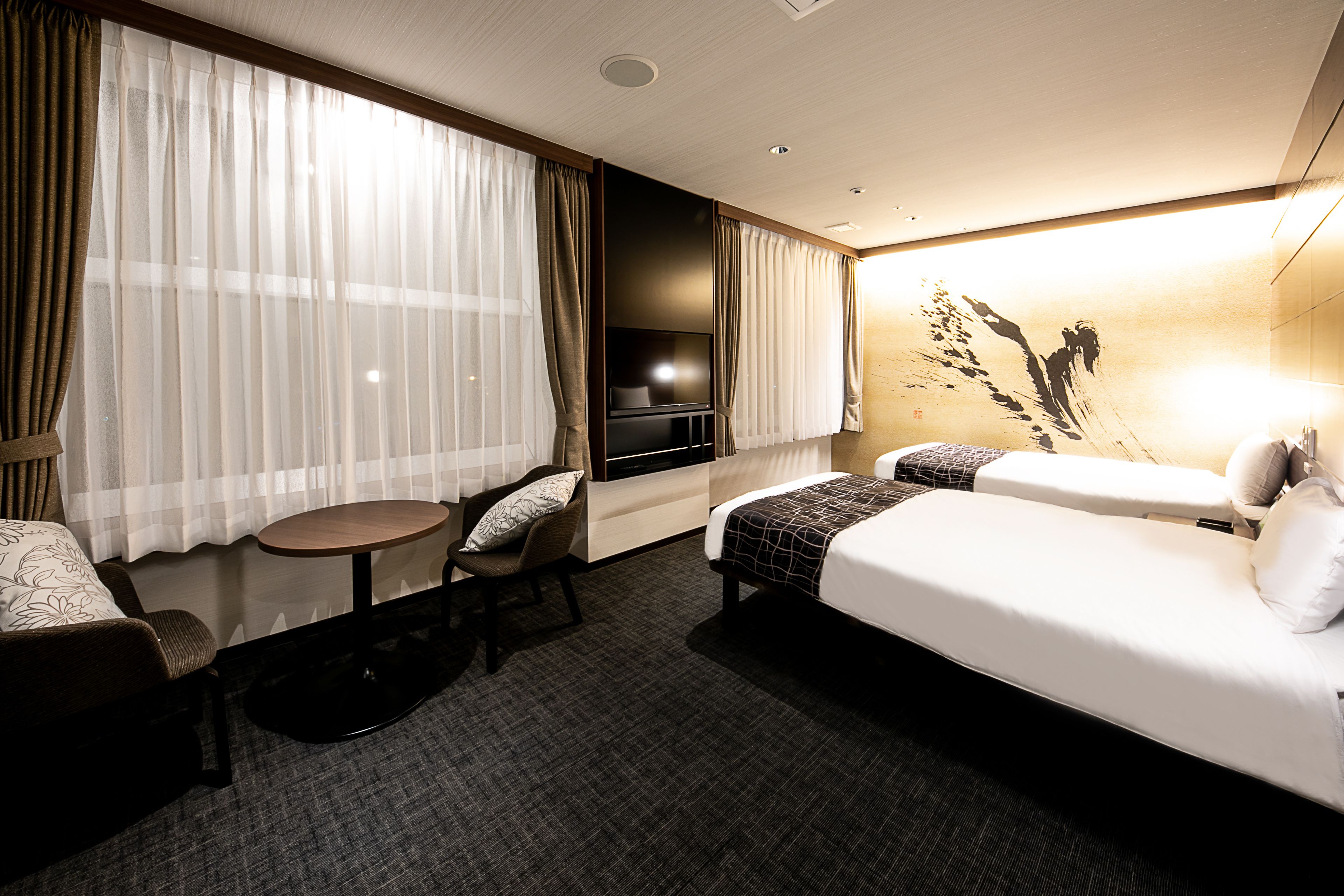 premium bedding, memory-foam beds, in-room safe, blackout curtains