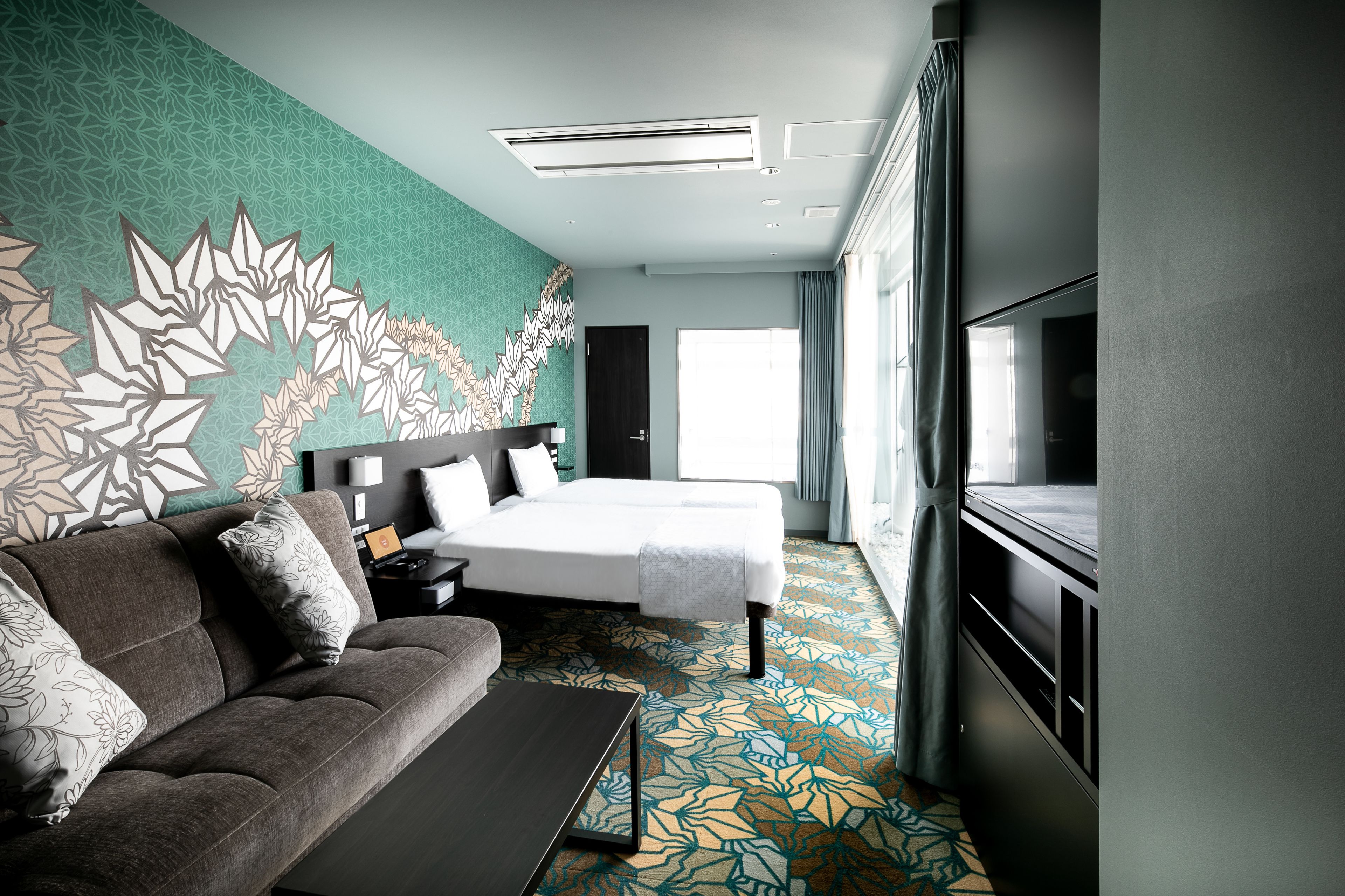 designers hollywood twin room | premium bedding, memory-foam beds, in-room safe, blackout curtains